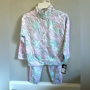 Adidas track suit in color ice mint.